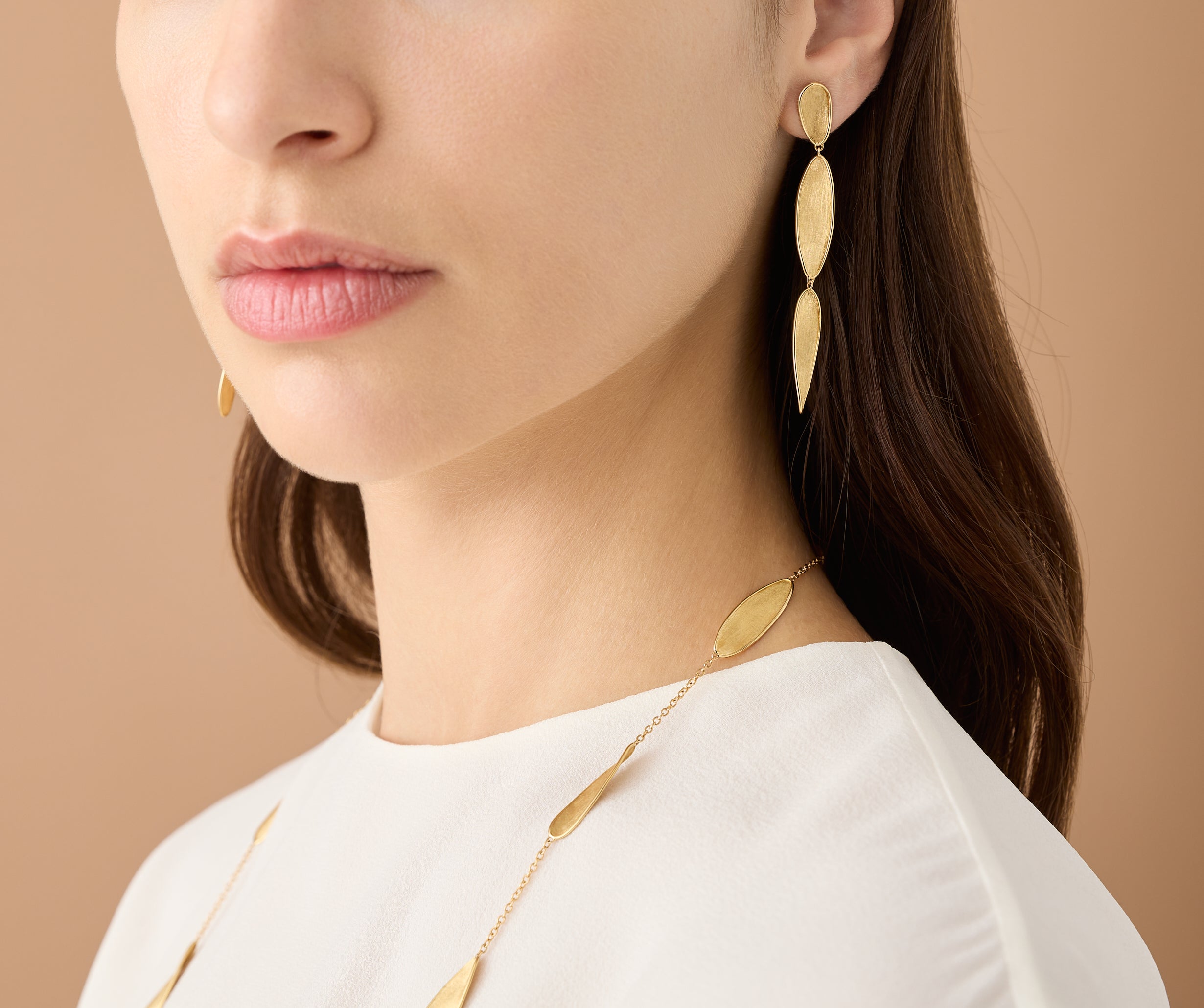 18kt yellow gold triple leaf earrings