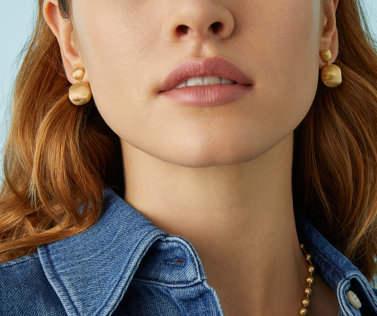 Gold two-bead drop earrings