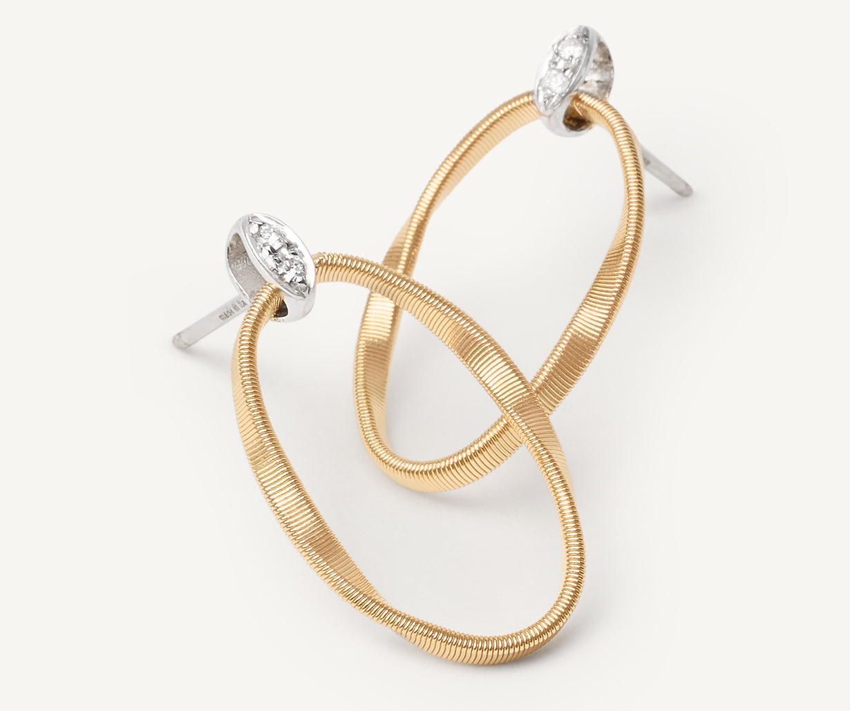 Gold stud earrings with diamonds