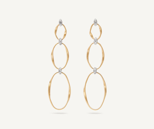 Gold diamond earrings with three elements