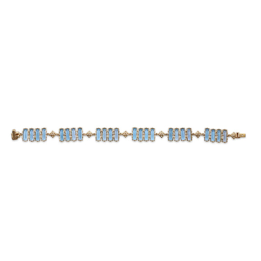 luxury-swiss-blue-topaz-and-diamond-bracelet-in-18k-gold