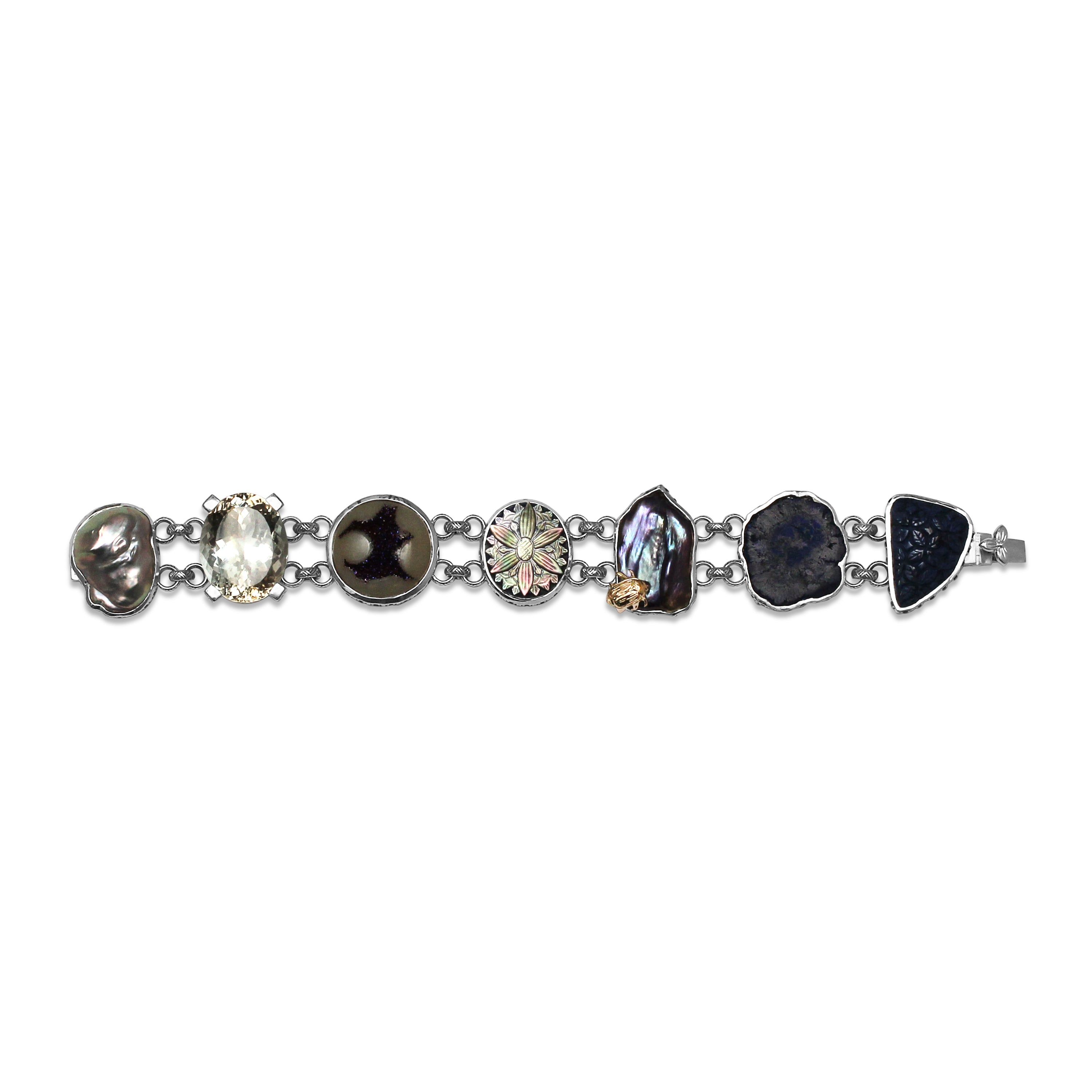 one-of-a-kind-blue-sapphire-natural-druzy-tahitian-carved-top-over-blue-sodalite-azurite-nodule-carved-blue-lapis-pearl-formation-facet-champagne-pearl-formation-bracelet-in-sterling-silver-with-18k-gold-adam