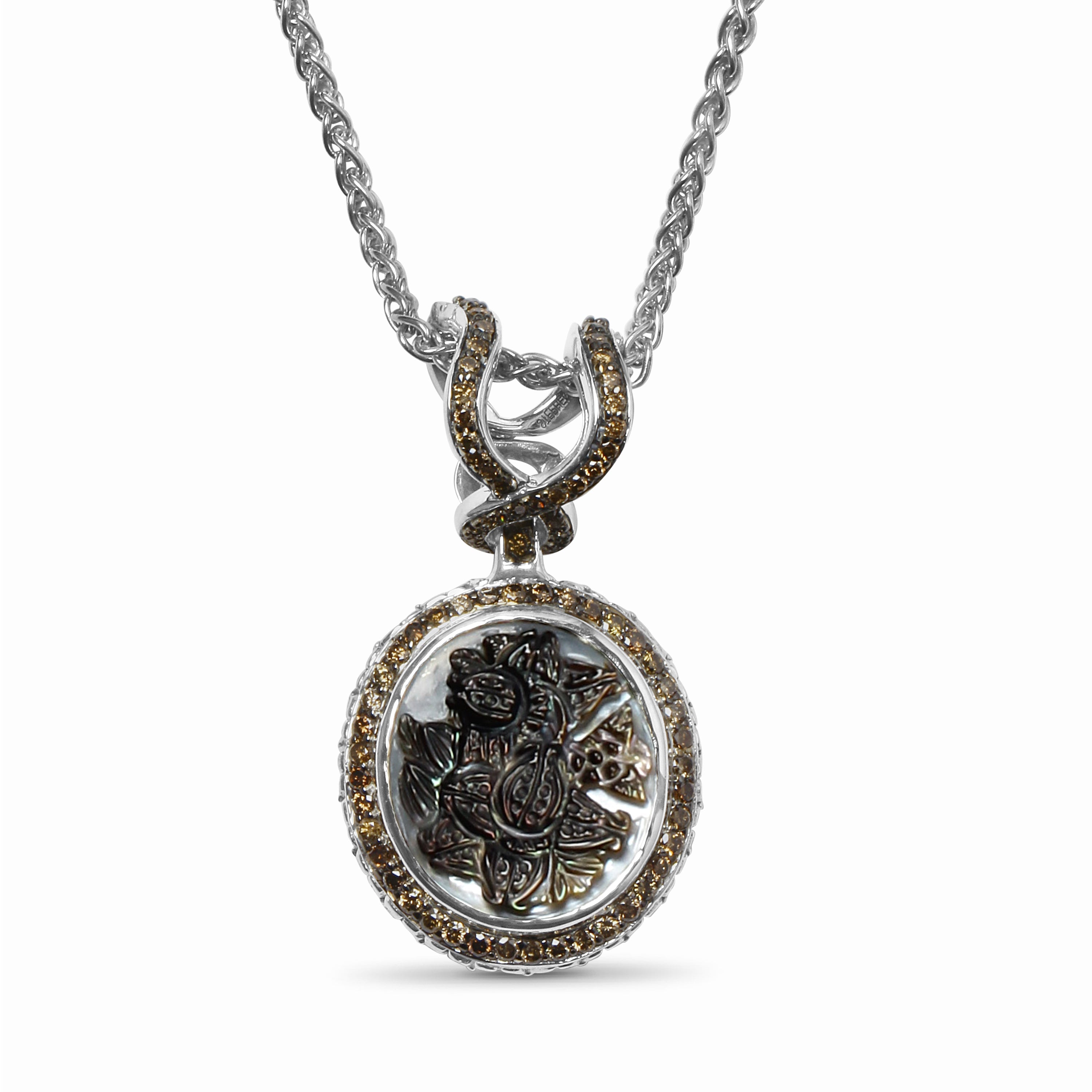 hand-carved-tahitian-mother-of-pearl-pendant-in-sterling-silver-with-champagne-diamonds