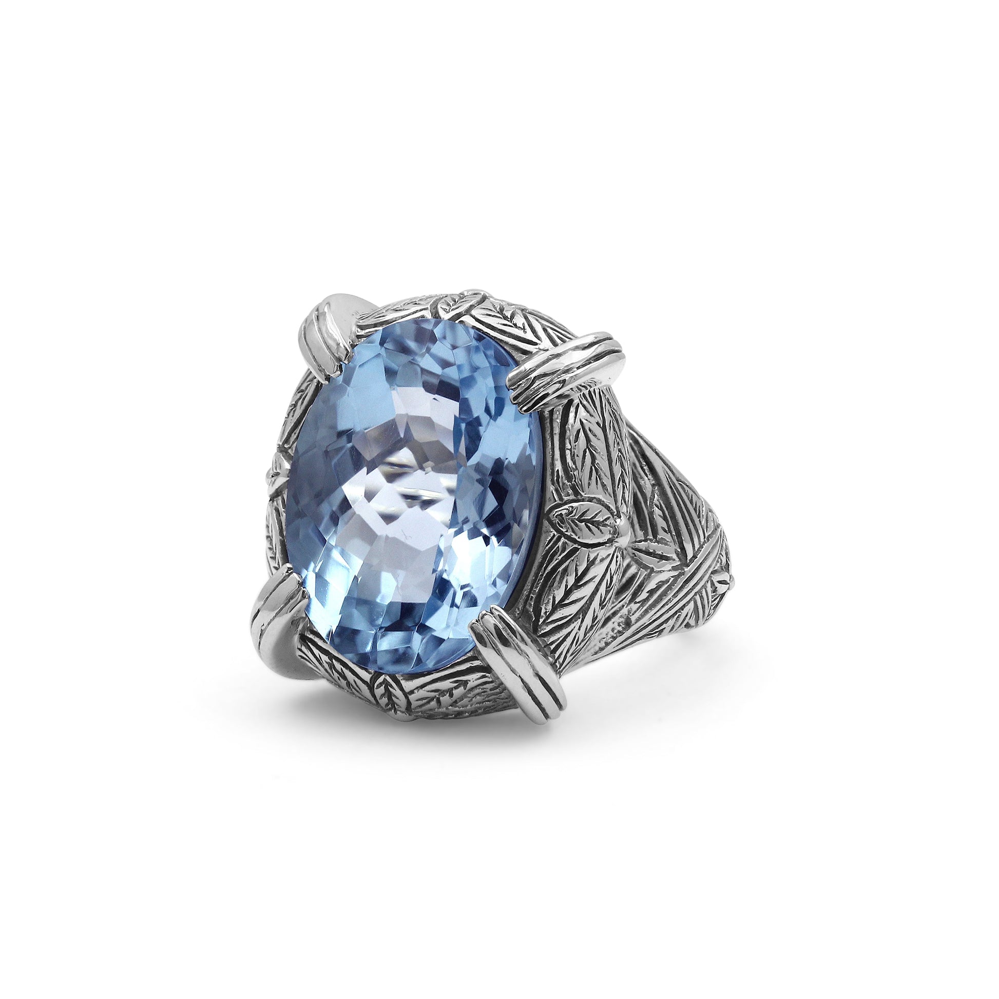 garden-of-stephen-faceted-blue-topaz-ring-in-engraved-sterling-silver