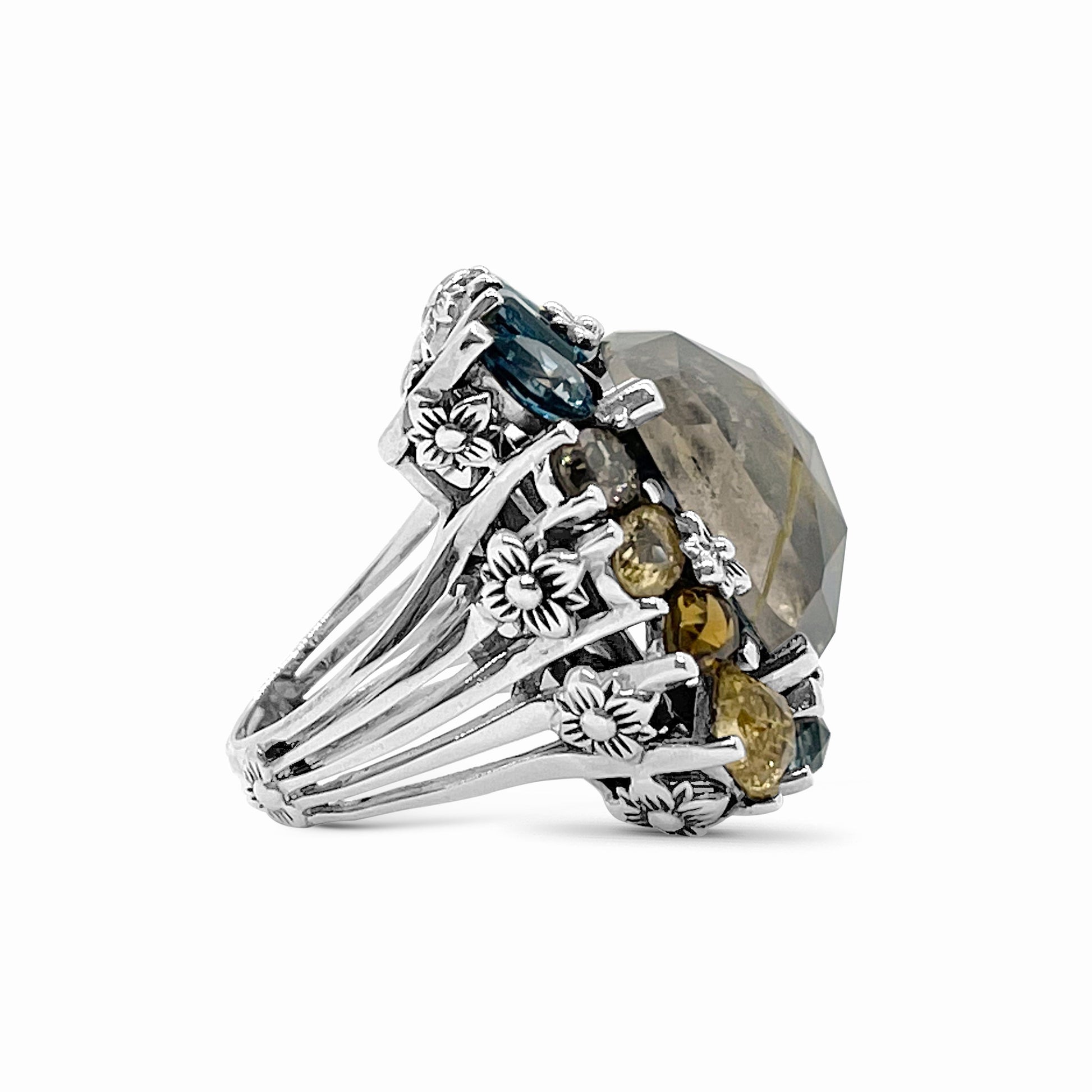 rockrageous-gold-hair-rutilated-quartz-hematite-sky-swiss-and-london-blue-topaz-cognac-whiskey-and-smoky-quartz-ring-in-sterling-silver