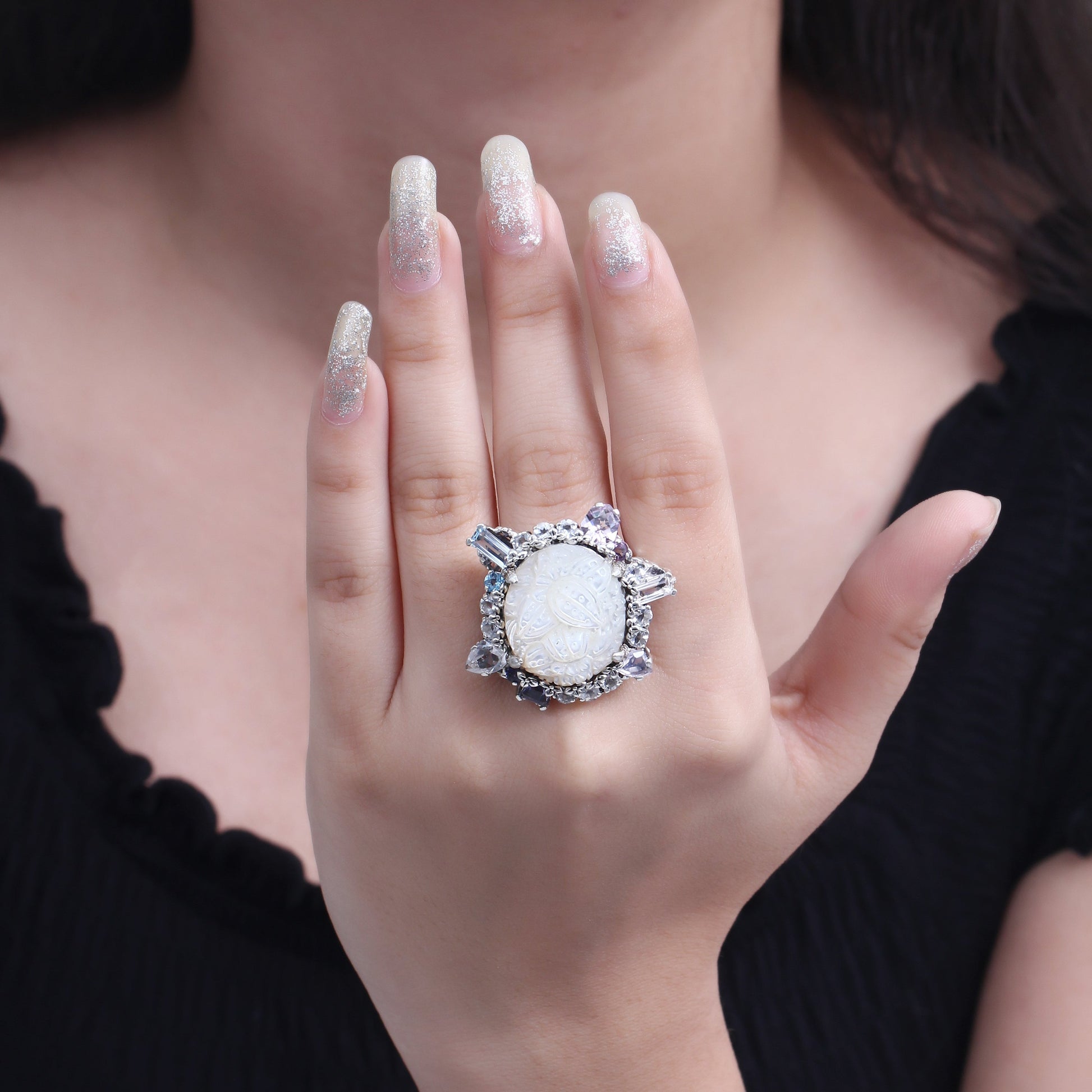 rockrageous-hand-carved-mother-of-pearl-lavender-moon-quartz-amethyst-iolite-blue-and-white-topaz-ring-in-sterling-silver