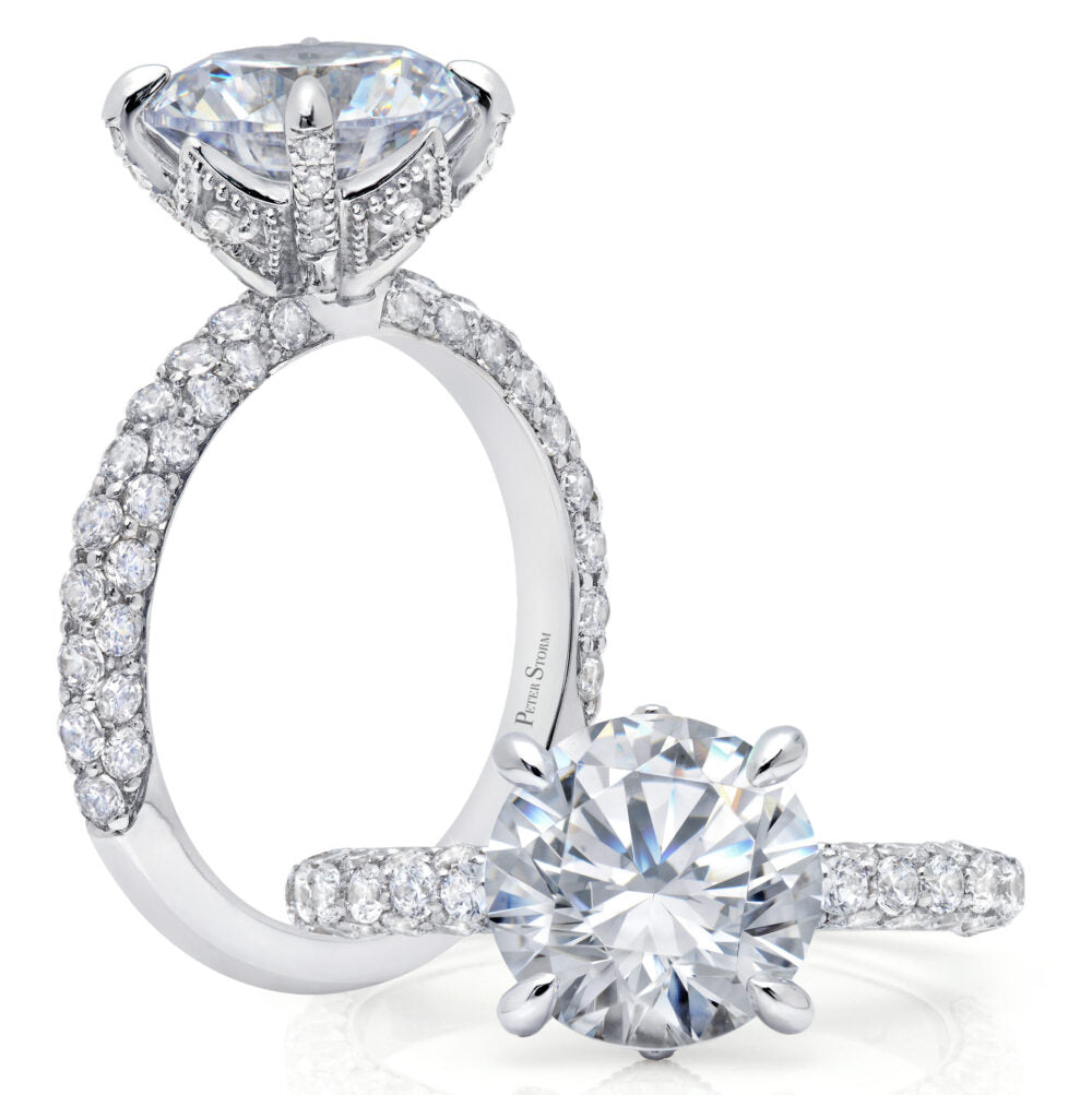 Peter Storm Peter’s take on a dramatic solitaire, this ring features delicate designs around the head WSM169_4DiaW  WSM169_4DiaW