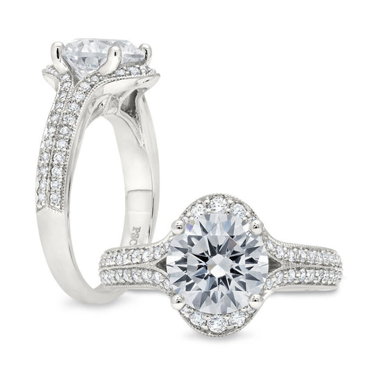 Peter Storm A double row of diamonds forms a beautiful oval shape halo for your round stone WSM375_4DiaW  WSM375_4DiaW