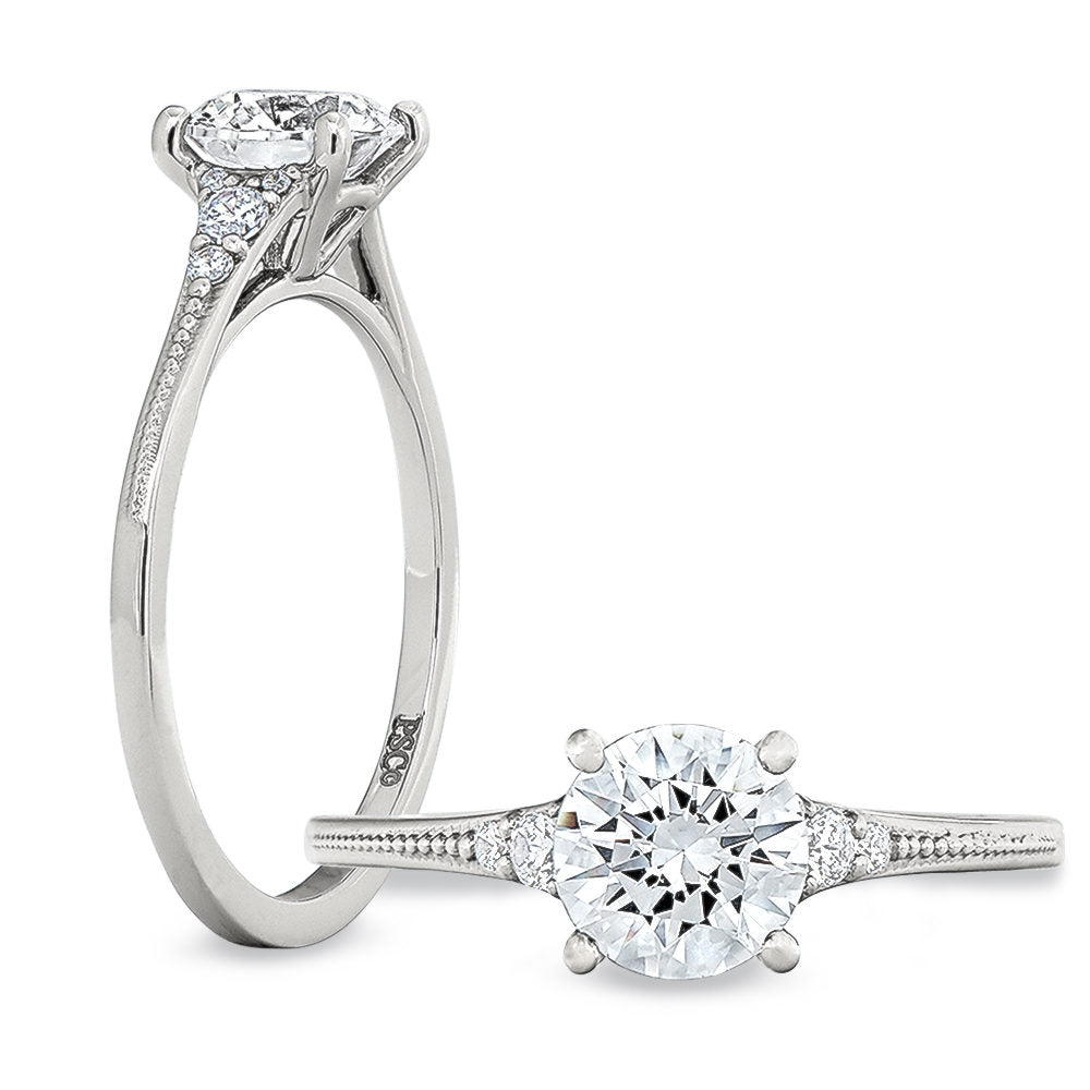 Peter Storm A simple but elegant band, it features a solitaire head with shoulders featuring 3 diamonds WSM475_4DiaW  WSM475_4DiaW