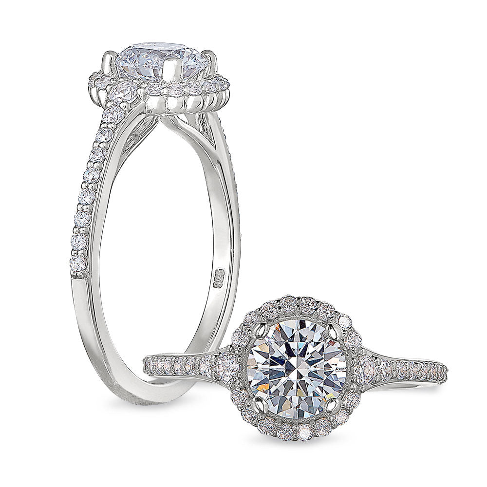 Peter Storm This ring features graduated diamonds that start next to your center and flow down the ring WSM489_4DiaW  WSM489_4DiaW