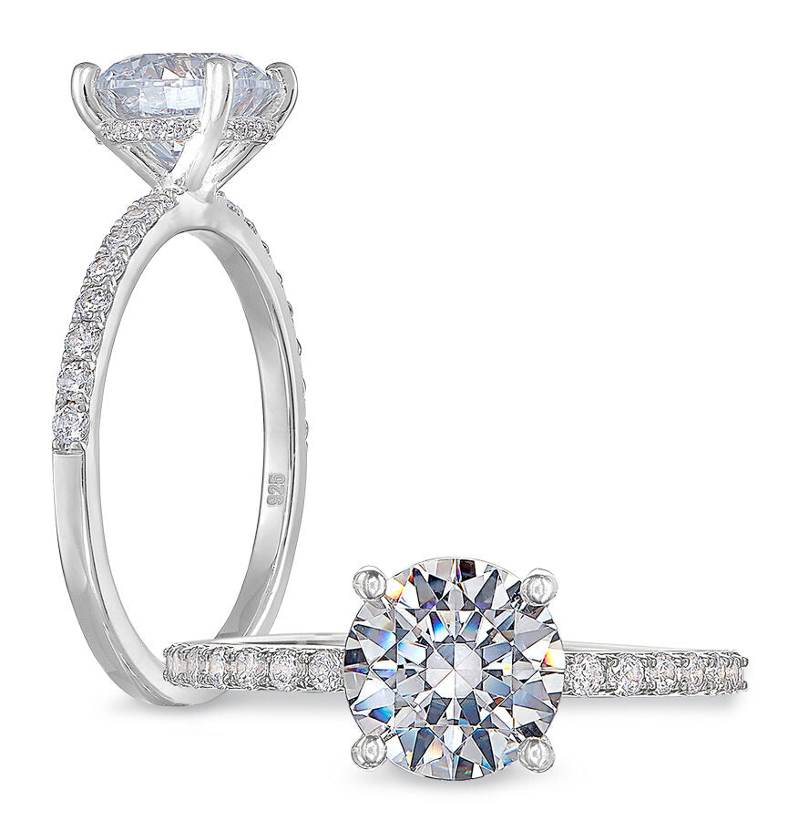 Peter Storm A single row of diamonds flows from each side of your center WSM491_4DiaW  WSM491_4DiaW