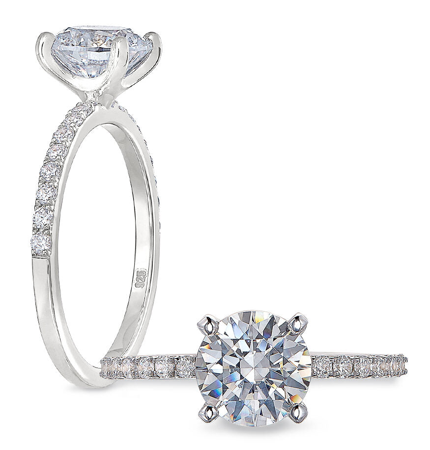 Peter Storm A single row of diamonds flows from each side of your center WSM492_4DiaW  WSM492_4DiaW