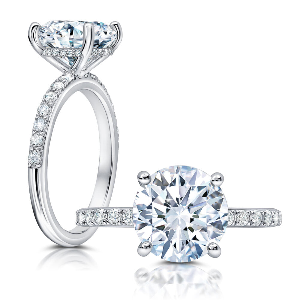 Peter Storm A classic, this hidden halo features larger diamonds on the shank WSM496_4DiaW  WSM496_4DiaW