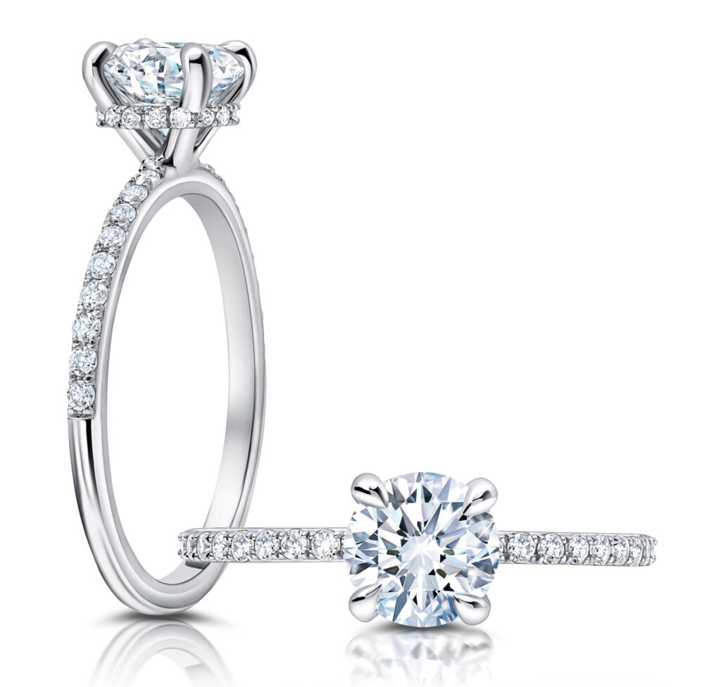 Peter Storm A classic, this hidden loop halo features larger diamonds on the shank WSM498_4DiaW  WSM498_4DiaW