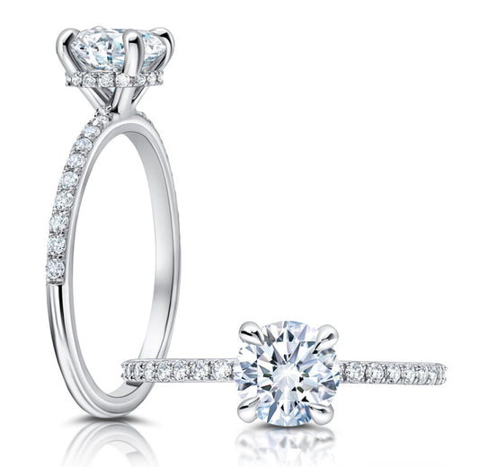 Peter Storm A classic, this hidden loop halo features larger diamonds on the shank WSM498_4DiaW  WSM498_4DiaW