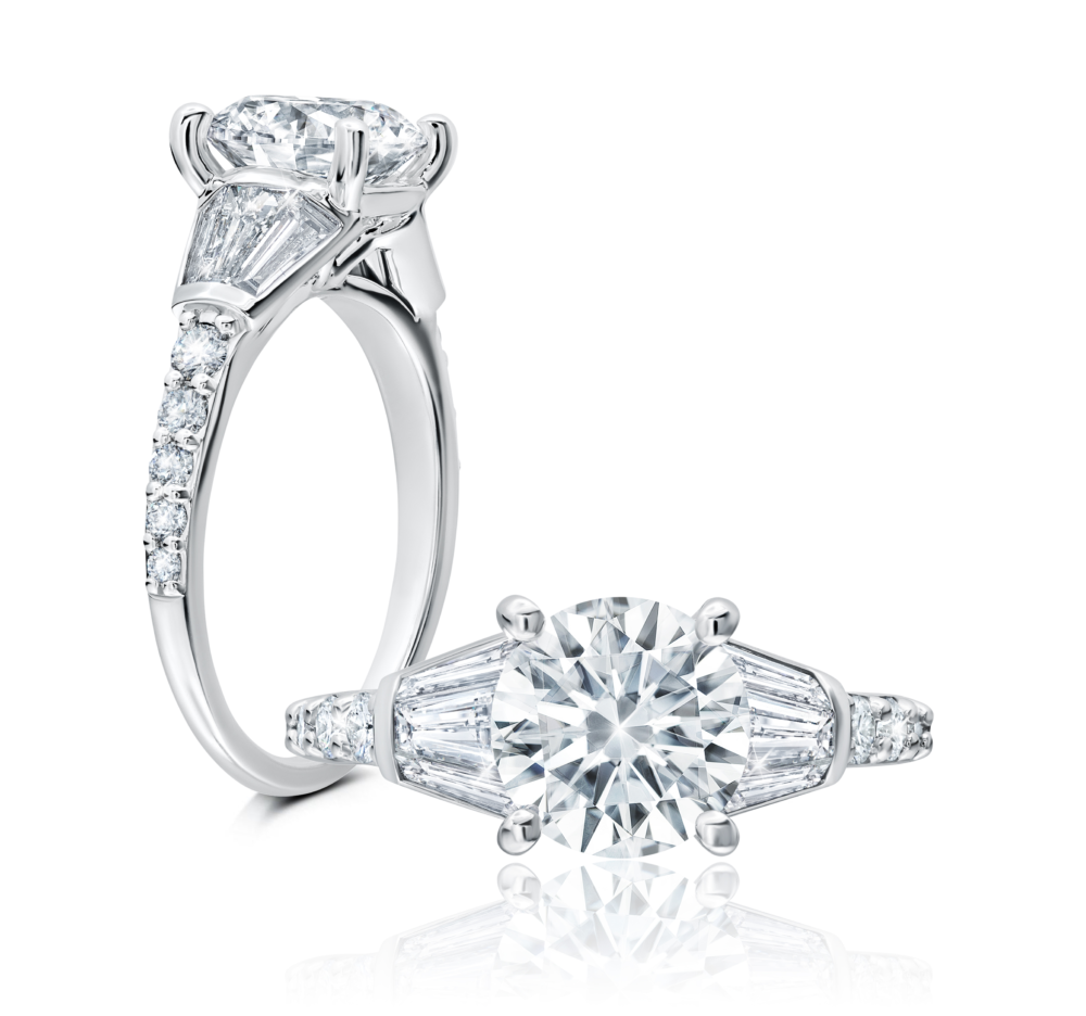 Peter Storm Dramatic, this ring has a triple of tapered baguettes that lead to a single row of diamonds down the shank WSM560_4DiaW  WSM560_4DiaW