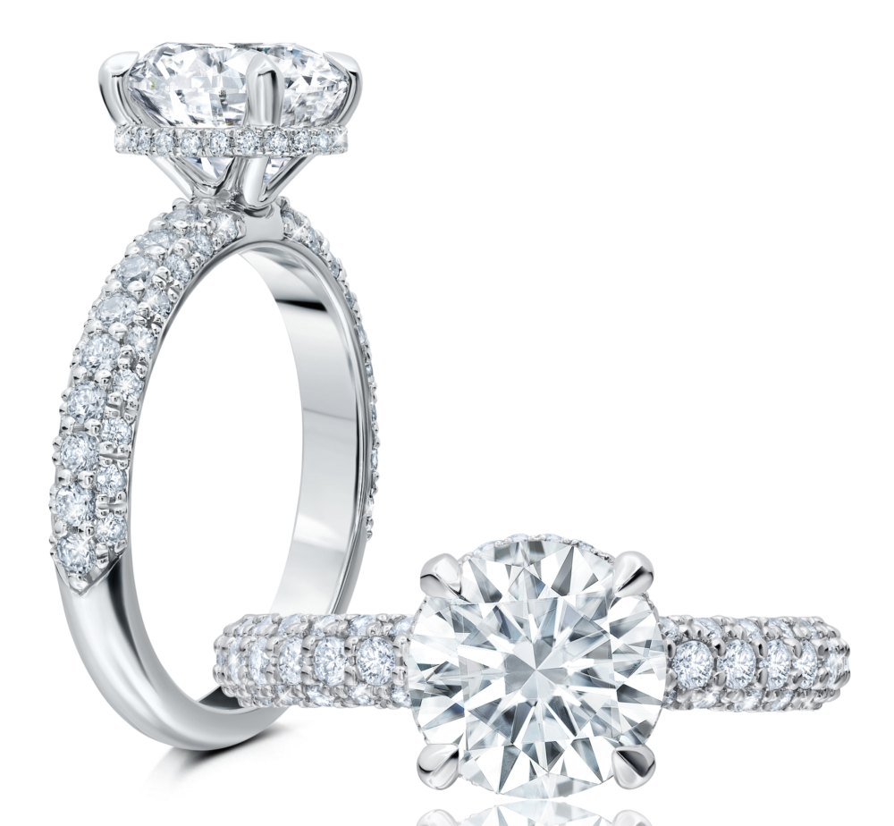 Peter Storm A beautiful piece, this ring has three rows of diamonds on the shank with a hidden halo under the center stone WSM562_4DiaW  WSM562_4DiaW
