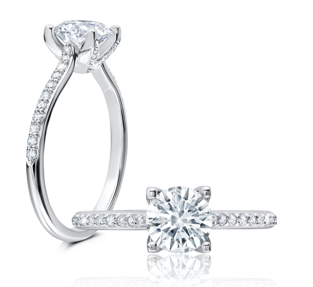 Peter Storm This charming ring features a floral-inspired halo with a brilliant round center WSM567_4DiaW  WSM567_4DiaW