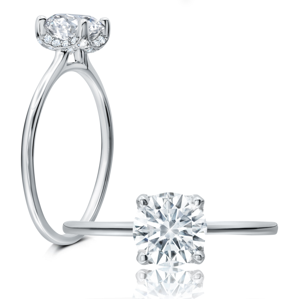Peter Storm This stylish ring features a petal-like halo with a shimmering round center – WSM571_4DiaW  WSM571_4DiaW