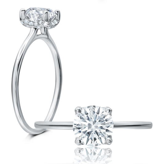 Peter Storm This stylish ring features a petal-like halo with a shimmering round center  WSM571_4DiaW  WSM571_4DiaW