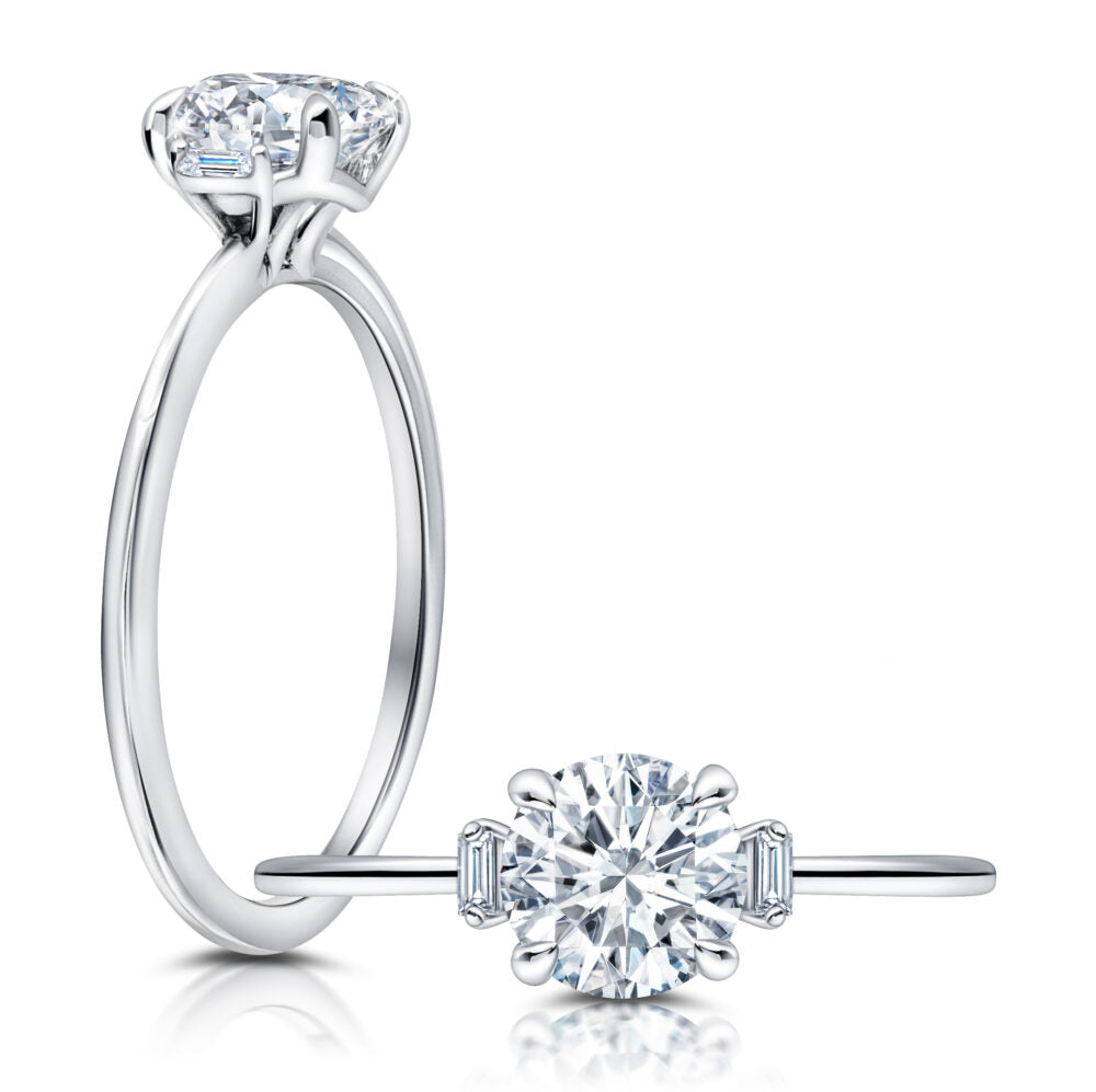 Peter Storm A classic twist on a three stone ring, this ring features two baguette diamonds sitting on either side of your chosen center WSM596_4DiaW  WSM596_4DiaW