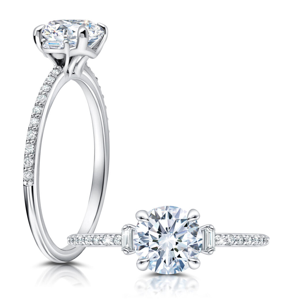Peter Storm A classic twist on a three stone ring, this ring features two baguette diamonds sitting on either side of your chosen center WSM597_4DiaW  WSM597_4DiaW