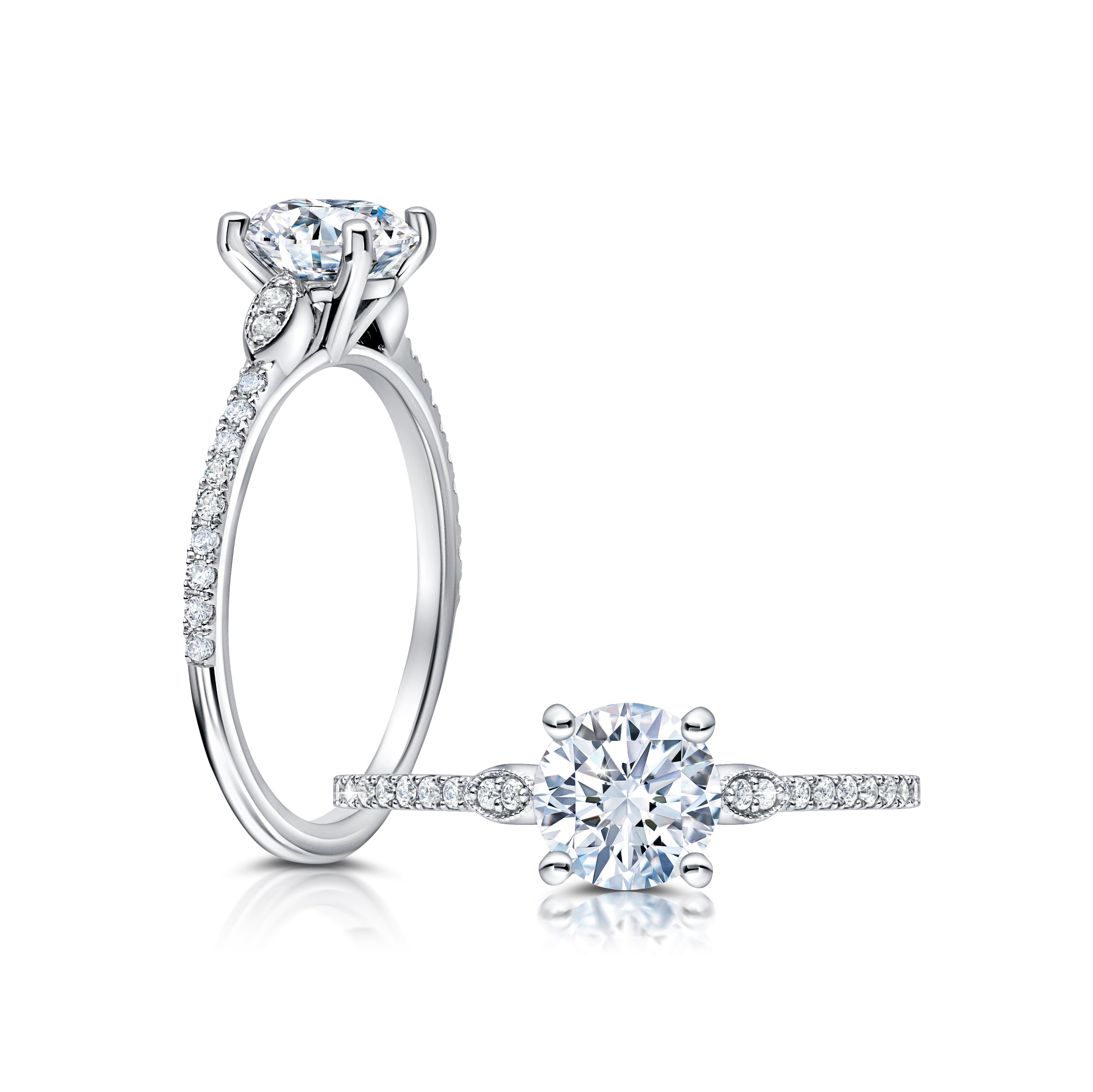 This radiant ring features a flower-shaped halo with a brilliant round center WSM605_4DiaY