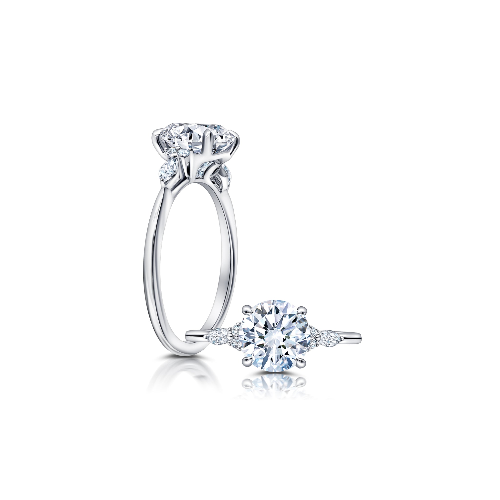 A classic twist on a three stone ring, this ring features two marquise and four round diamonds sitting on either side of your chosen center WSM608_4DiaY
