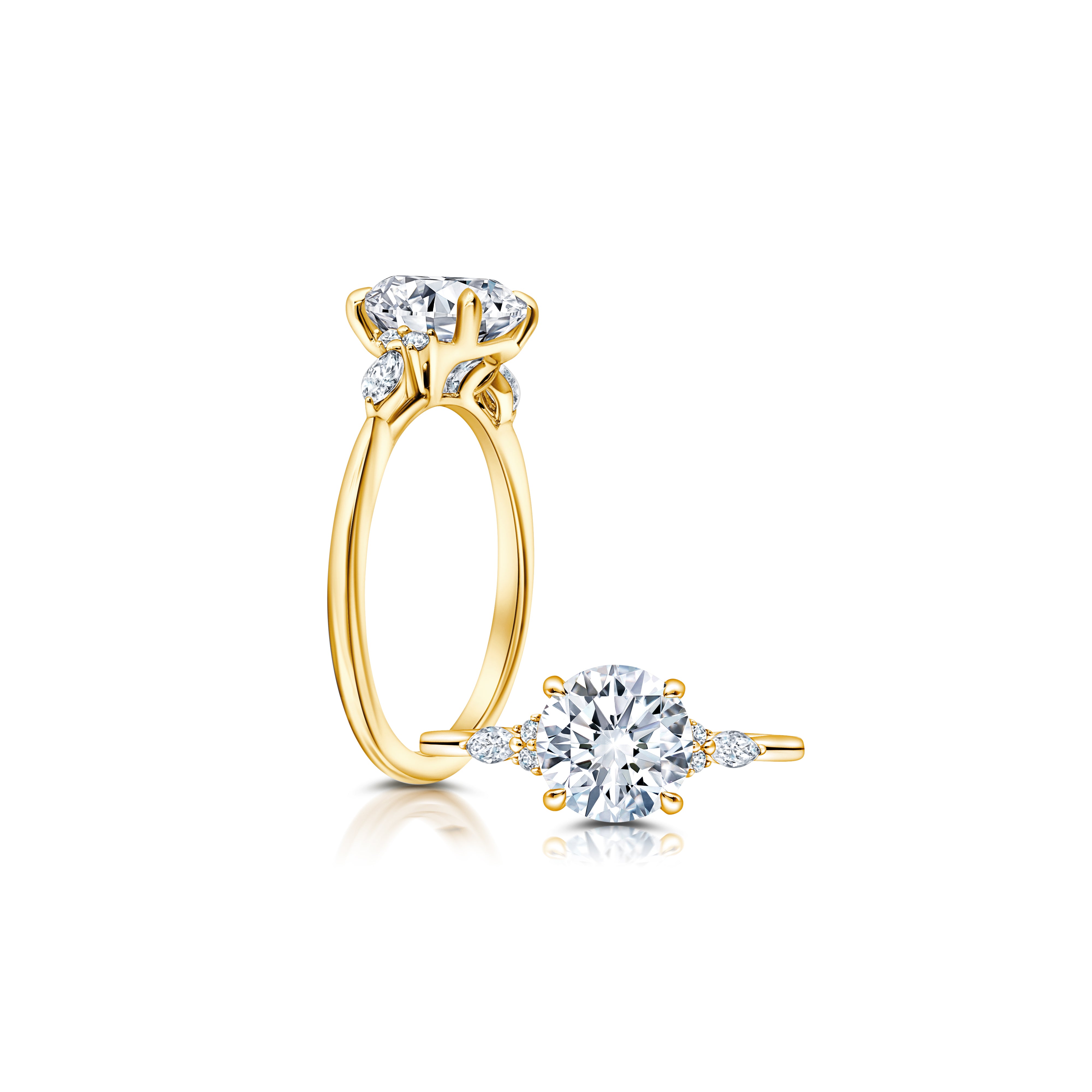 A classic twist on a three stone ring, this ring features two marquise and four round diamonds sitting on either side of your chosen center WSM608_4DiaW