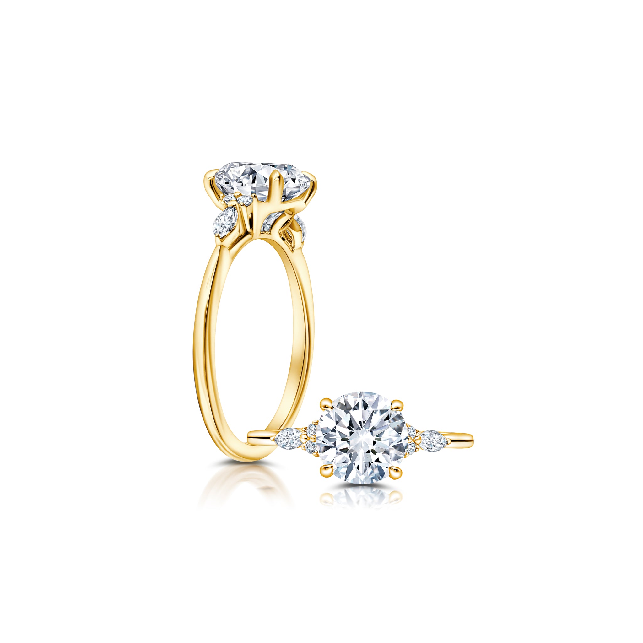 A classic twist on a three stone ring, this ring features two marquise and four round diamonds sitting on either side of your chosen center WSM608_4DiaW