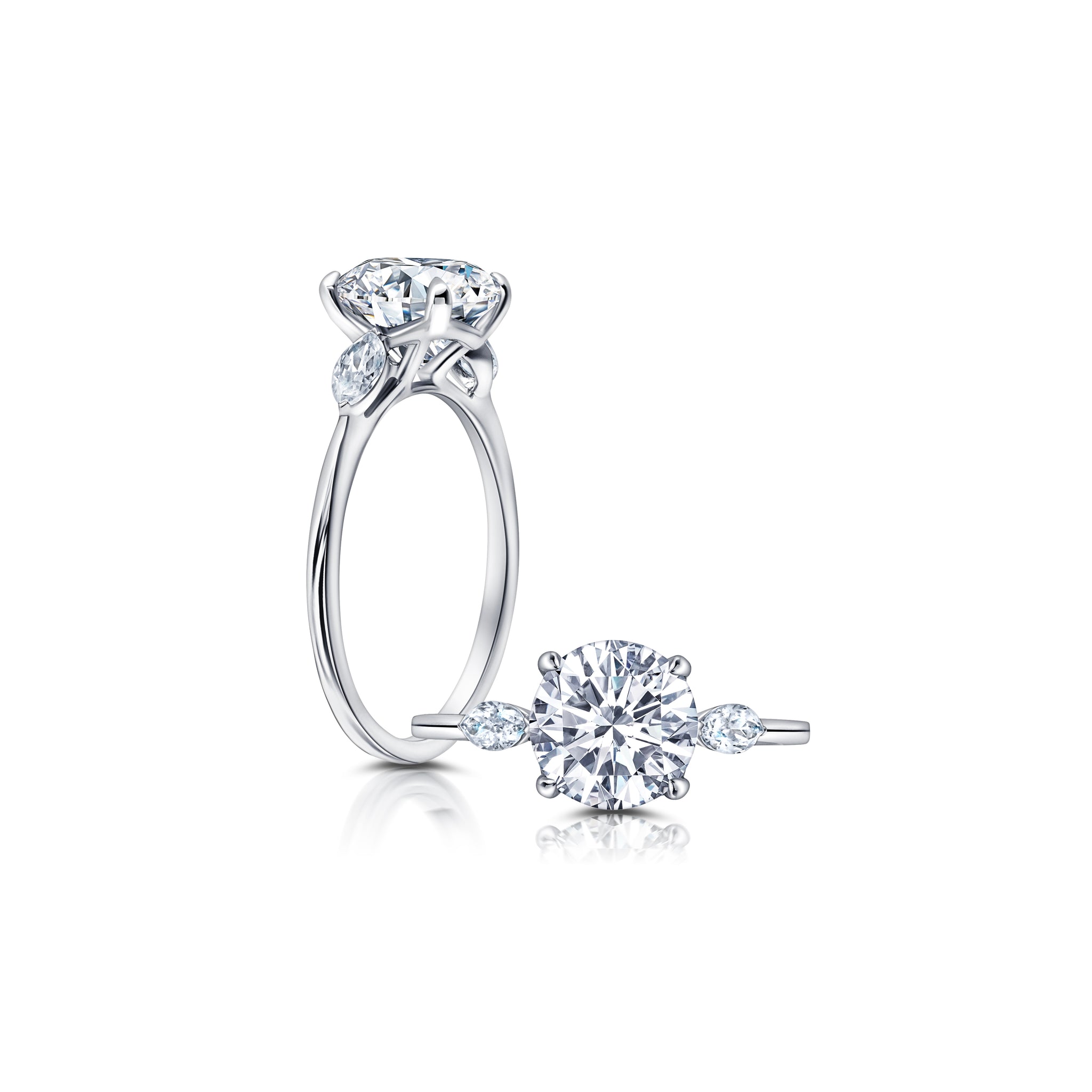 A classic twist on a three stone ring, this ring features two marquise diamonds sitting on either side of your chosen center WSM612_4DiaY