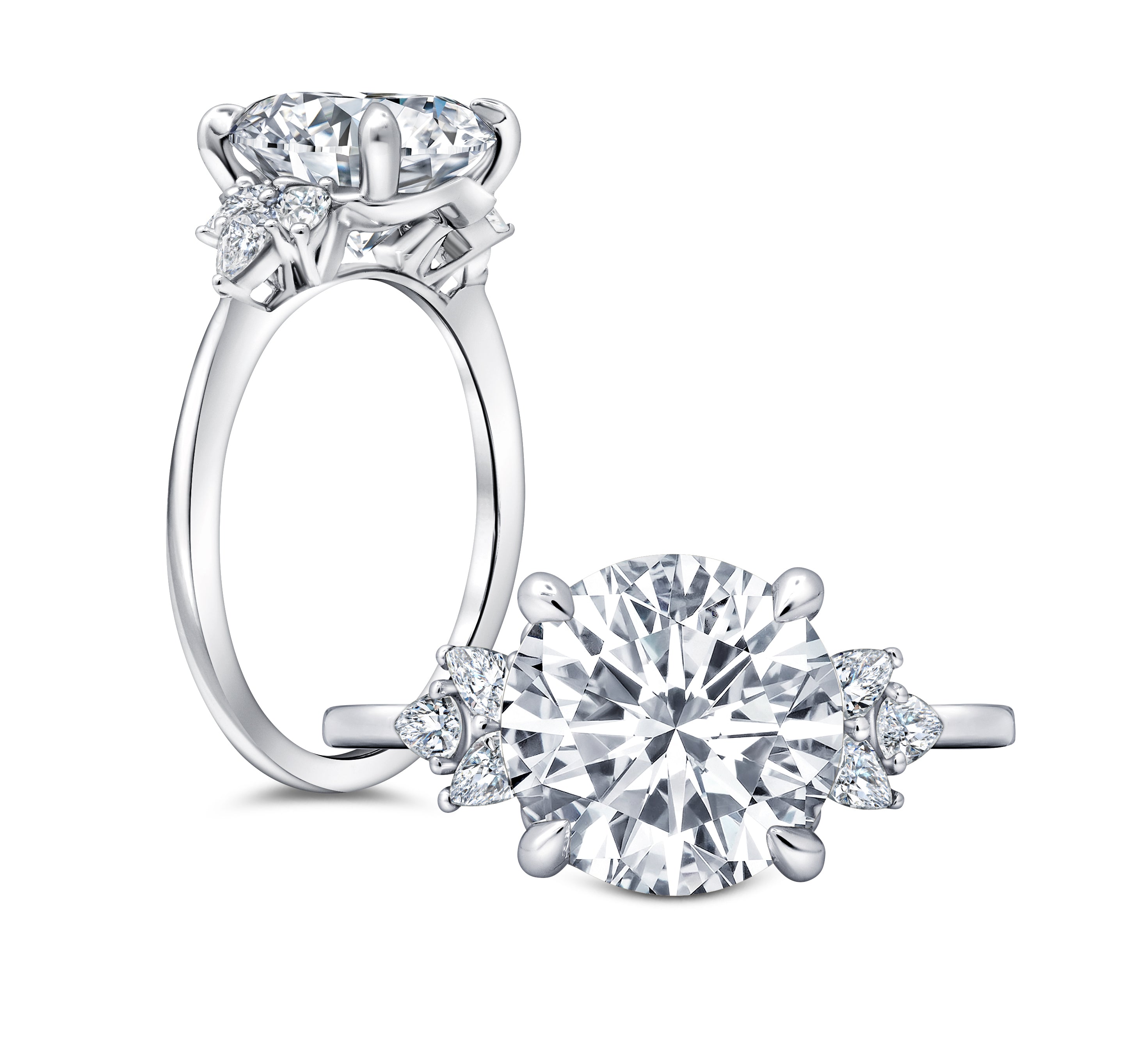 This radiant ring features a flower-shaped halo with a brilliant round center WSM617_4DiaY