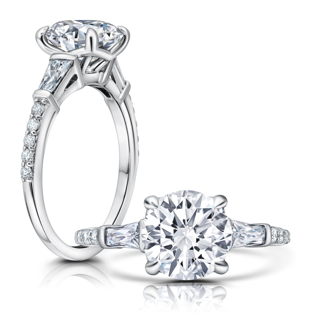 Peter Storm Peter adds a modern flair to this trapezoid three stone ring WSM649_4DiaW  WSM649_4DiaW