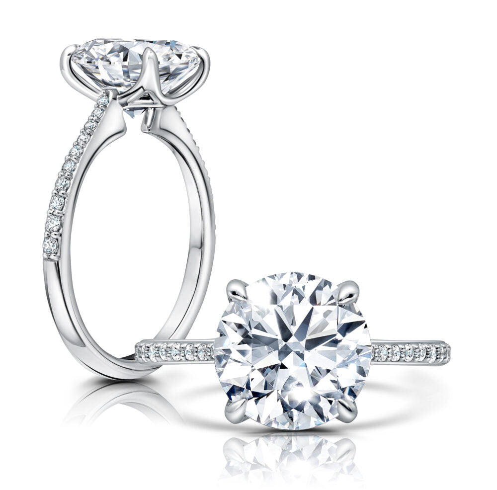 Peter Storm A classic, this hidden halo features reverse graduating diamonds on the shank WSM650_4DiaY  WSM650_4DiaY
