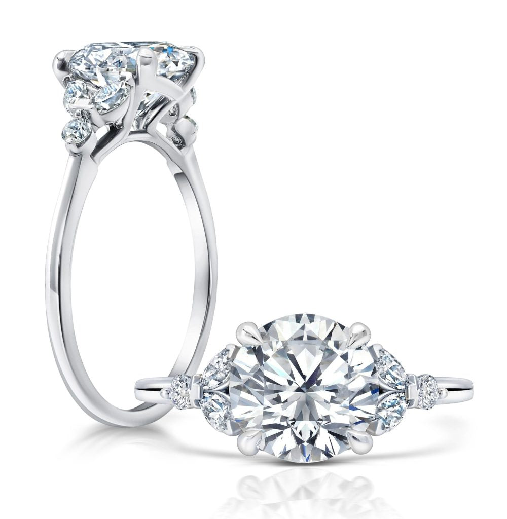 Peter Storm Peter adds a modern flair to this cluster three stone ring WSM681_4DiaW  WSM681_4DiaW