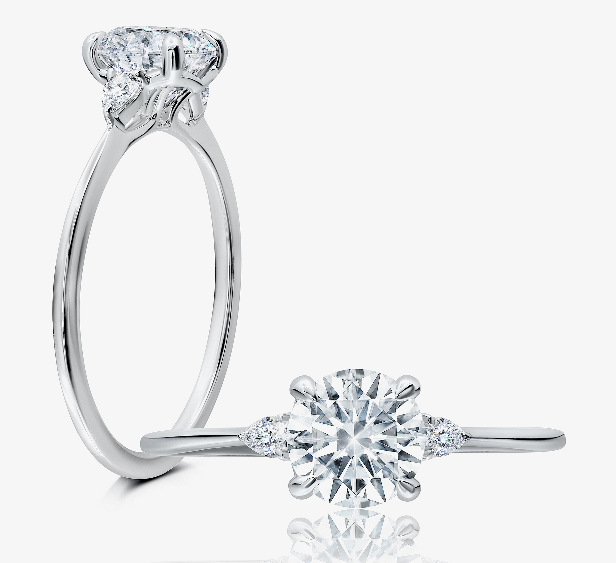 This radiant ring features a flower-shaped halo with a sparkling round center WSM665_4DiaY
