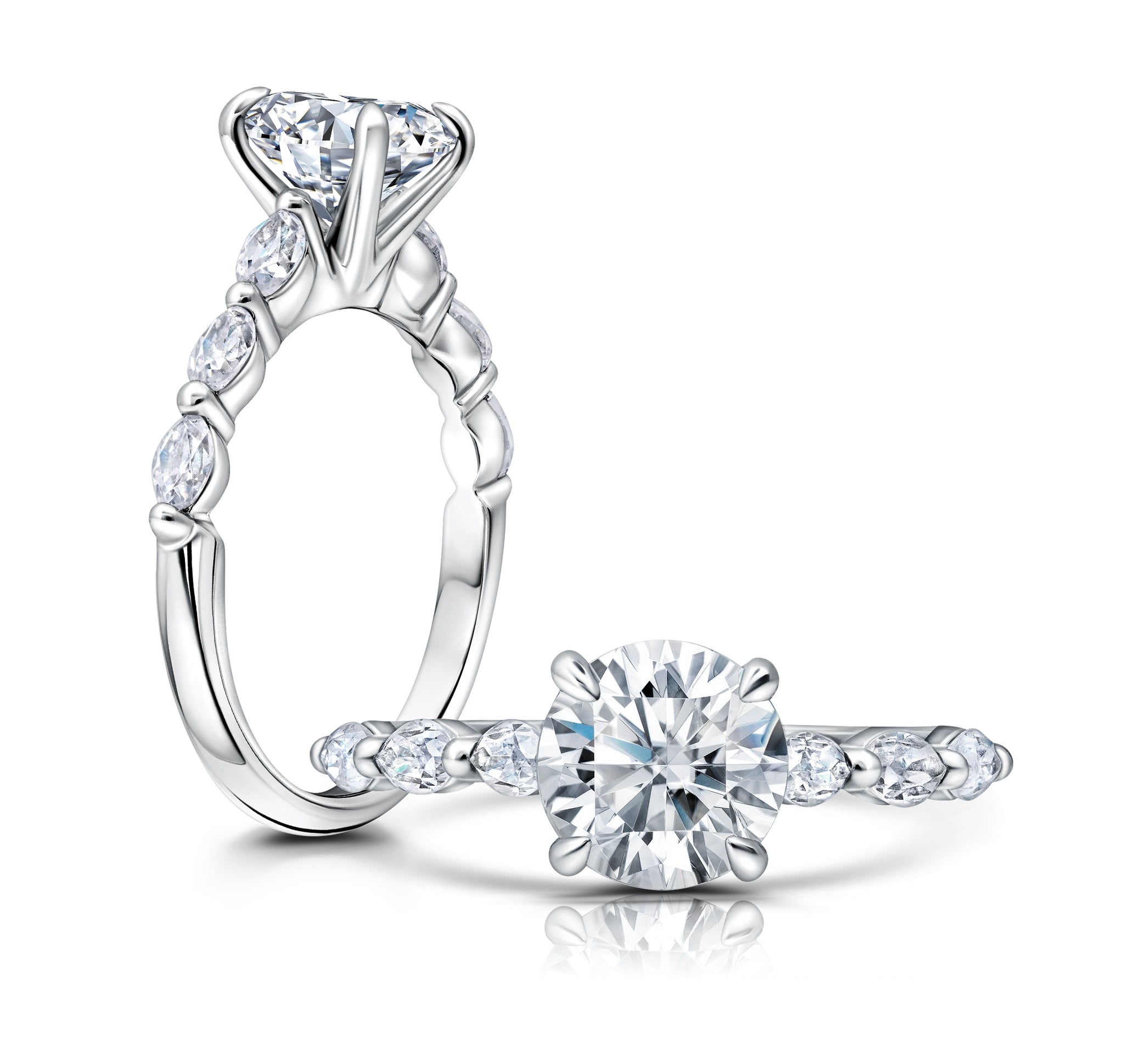 A classic twist on a three stone ring, this ring features three marquise sitting on either side of your chosen center WSM666_4DiaY