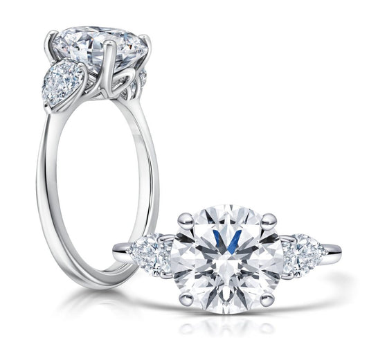 Peter Storm Peter adds a modern flair to this cluster three stone ring WSM670_4DiaW  WSM670_4DiaW