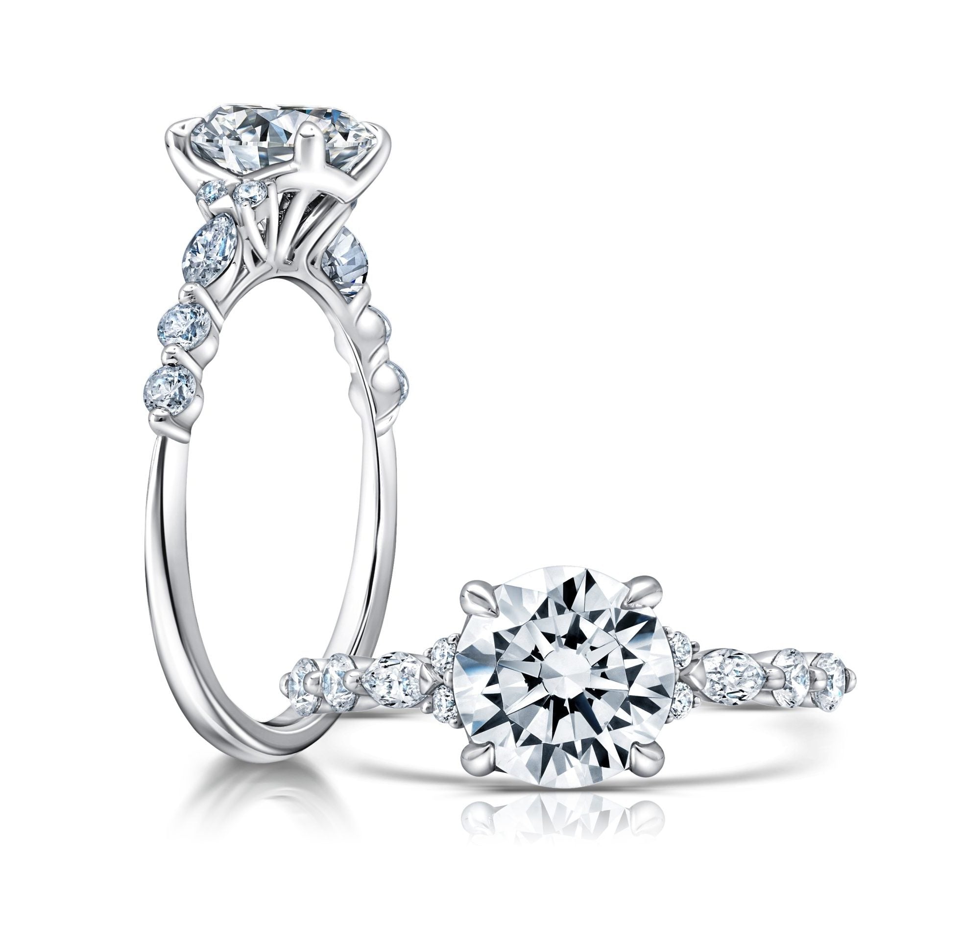Peter Storm This elegant ring features a flower-shaped halo with a sparkling round center WSM674_4DiaW  WSM674_4DIAW