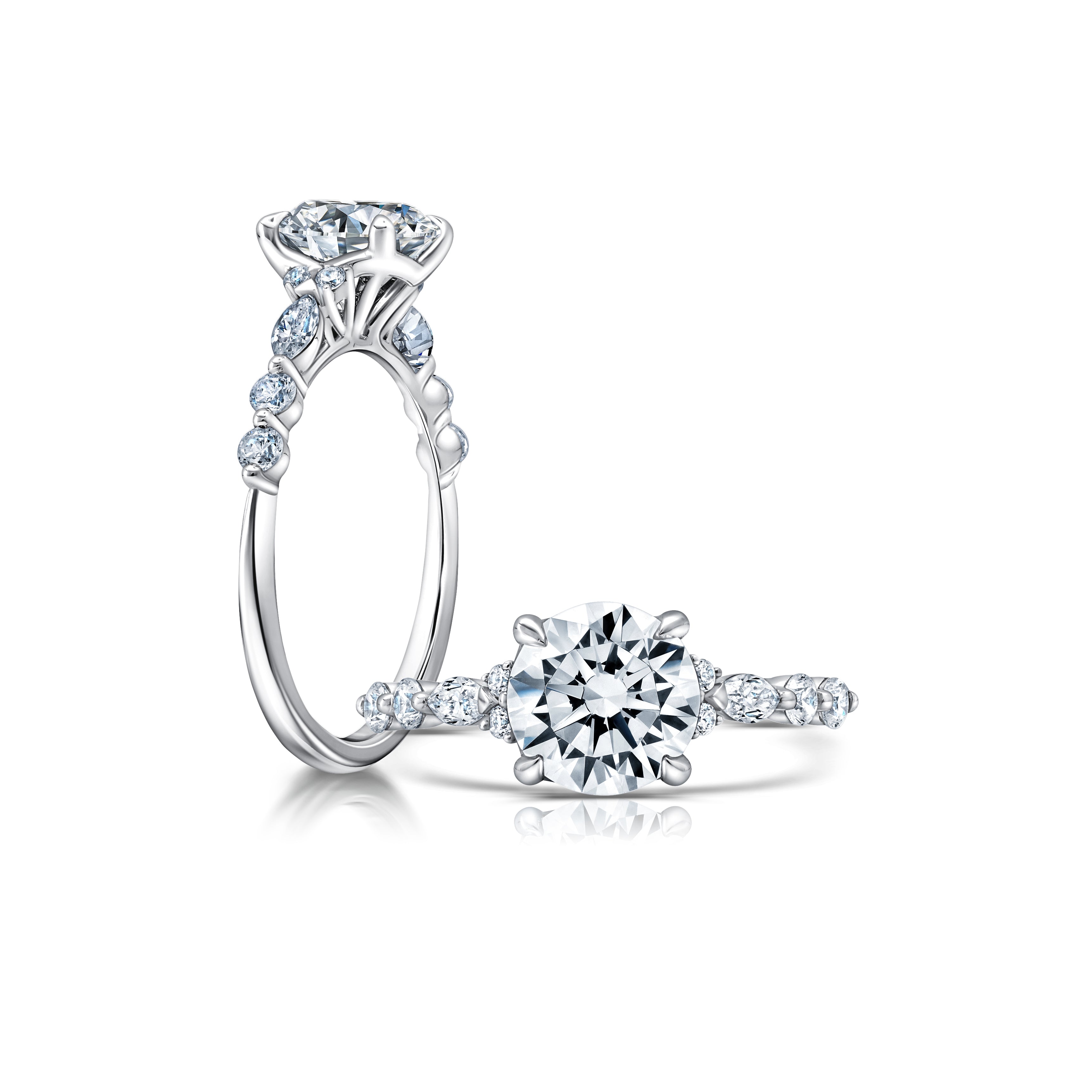 This radiant ring features a flower-shaped halo with a brilliant round center WSM674_4DiaY