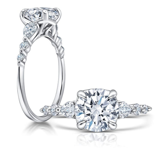 Peter Storm A classic twist on a three stone ring, this ring features two pear shape diamonds sitting on either side of your chosen center WSM675_4DIAW  WSM675_4DIAW