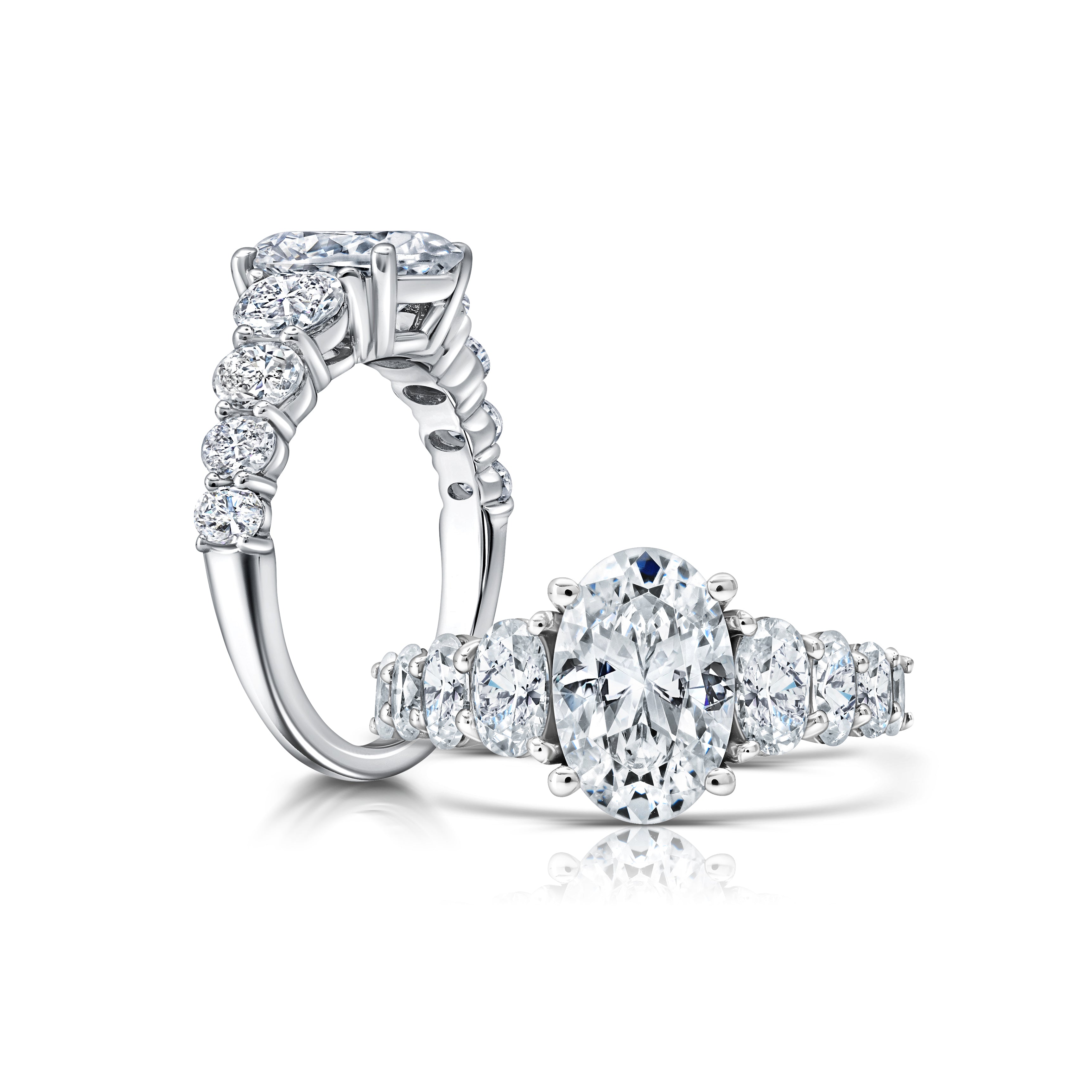 Peter adds a modern flair to this cluster three stone ring WSM679_4DIAY