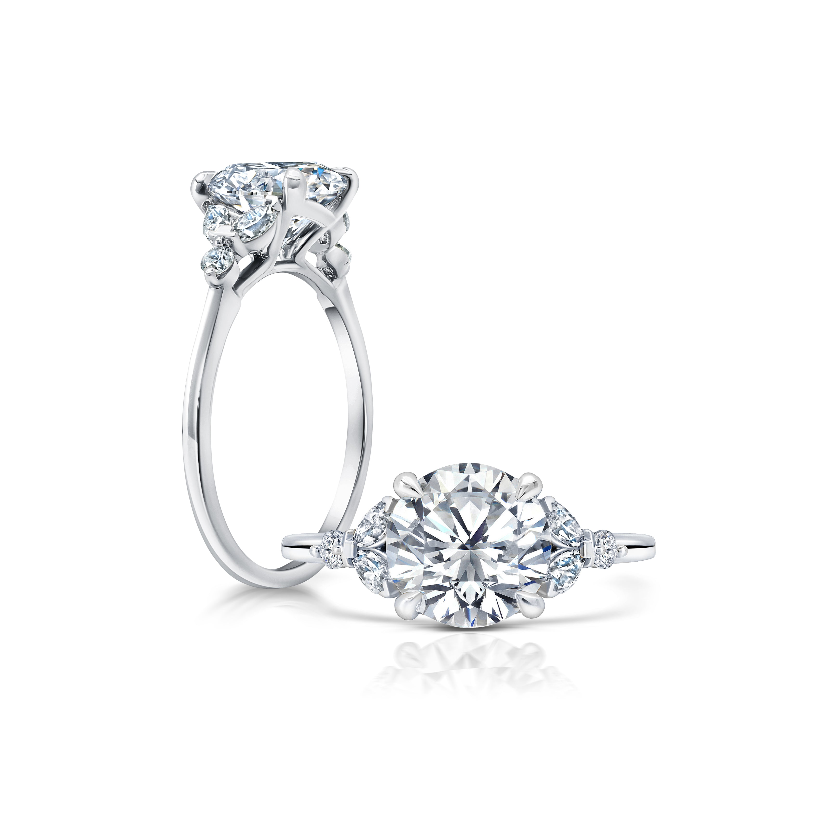 Peter adds a modern flair to this cluster three stone ring WSM681_4DIAY