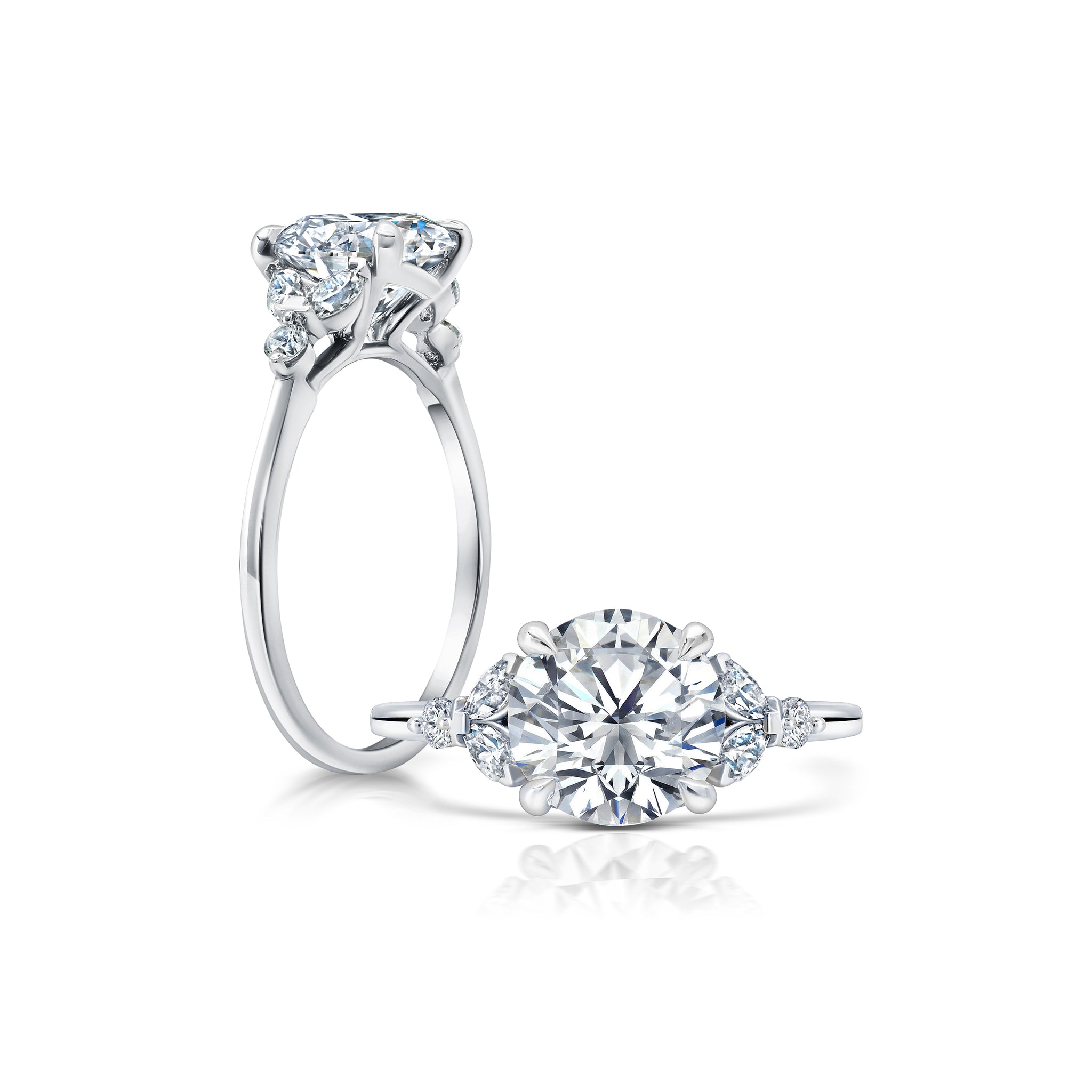 Peter adds a modern flair to this cluster three stone ring WSM681_4DIAY