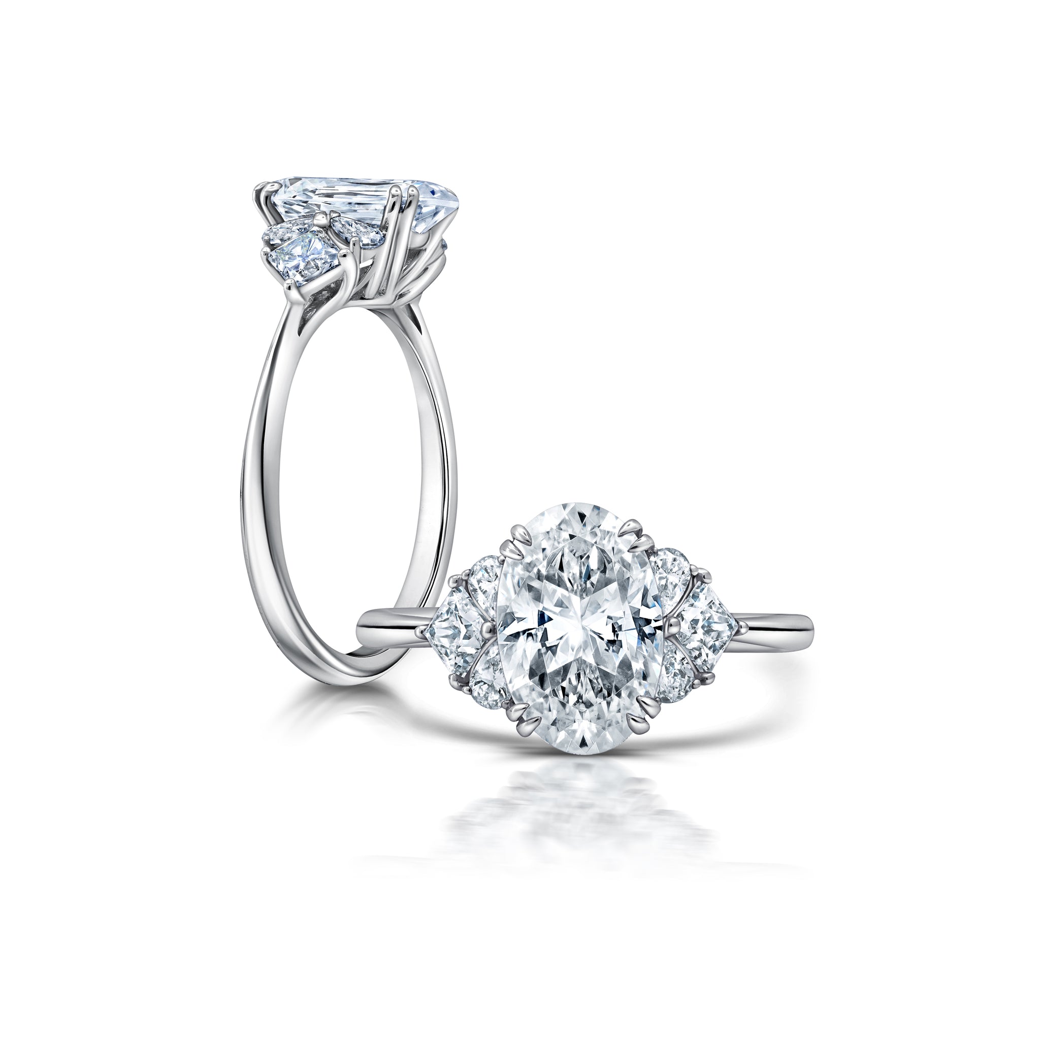 Peter adds a modern flair to this cluster three stone ring WSM696_4DIAY