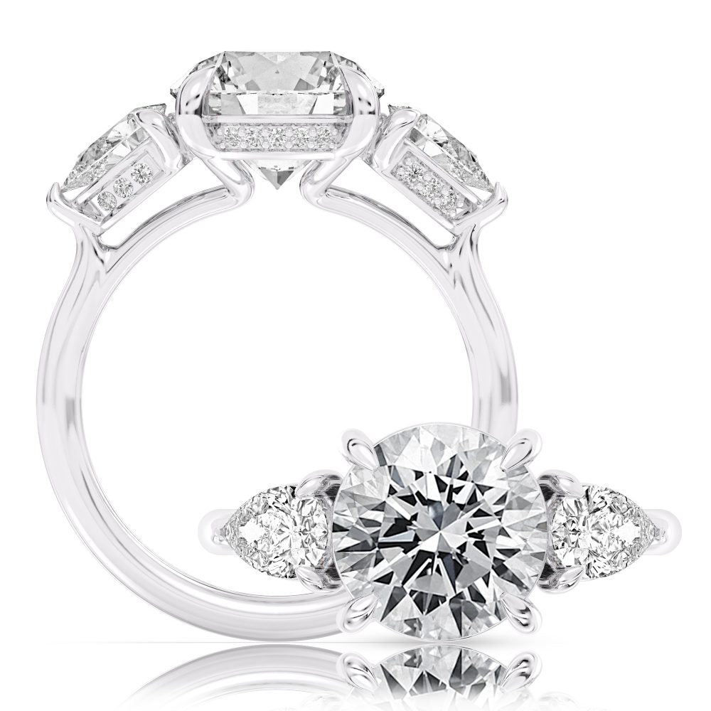 Peter Storm A classic three stone pear ring, adding a hidden halo for a little flair WSM734_4DiaW  WSM734_4DiaW