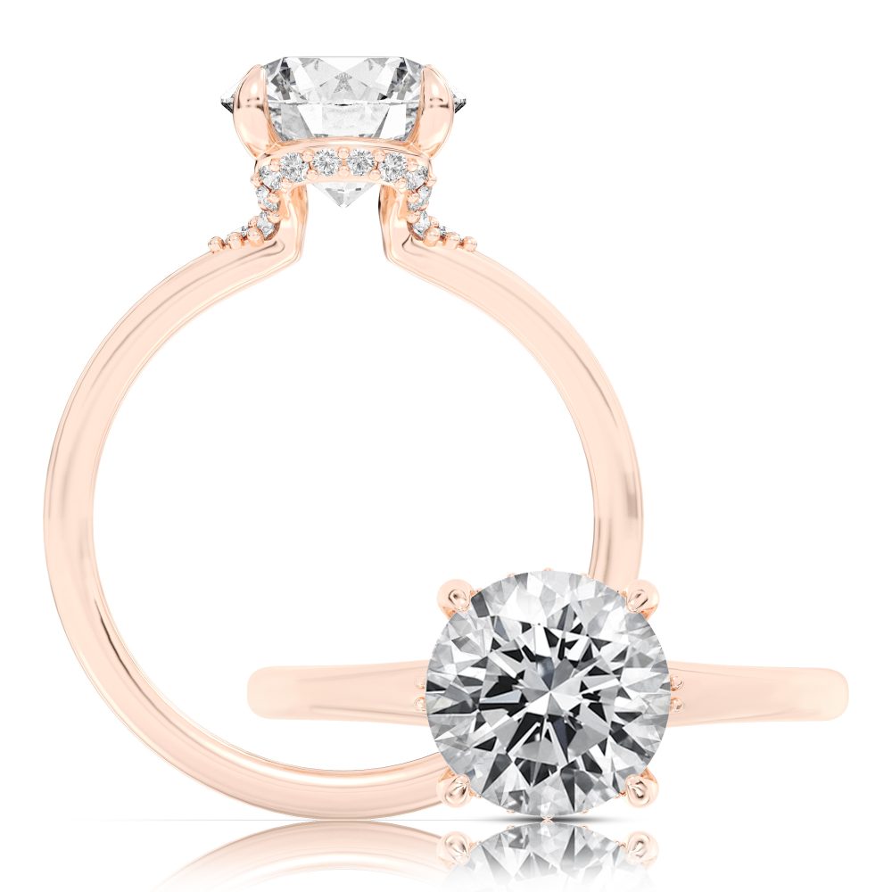 Peter Storm This playful ring features a flower-shaped halo with a sparkling round center WSM743_4DiaW  WSM743_4DiaW