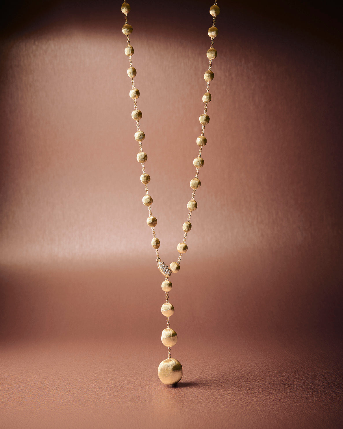 18kt yellow gold and diamond lariat necklace