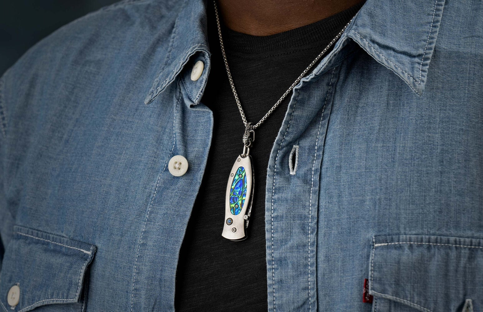 William Henry Titanium Knife pendant featuring Dichrolam®, and hand-forged damascus blade B02 FLASH