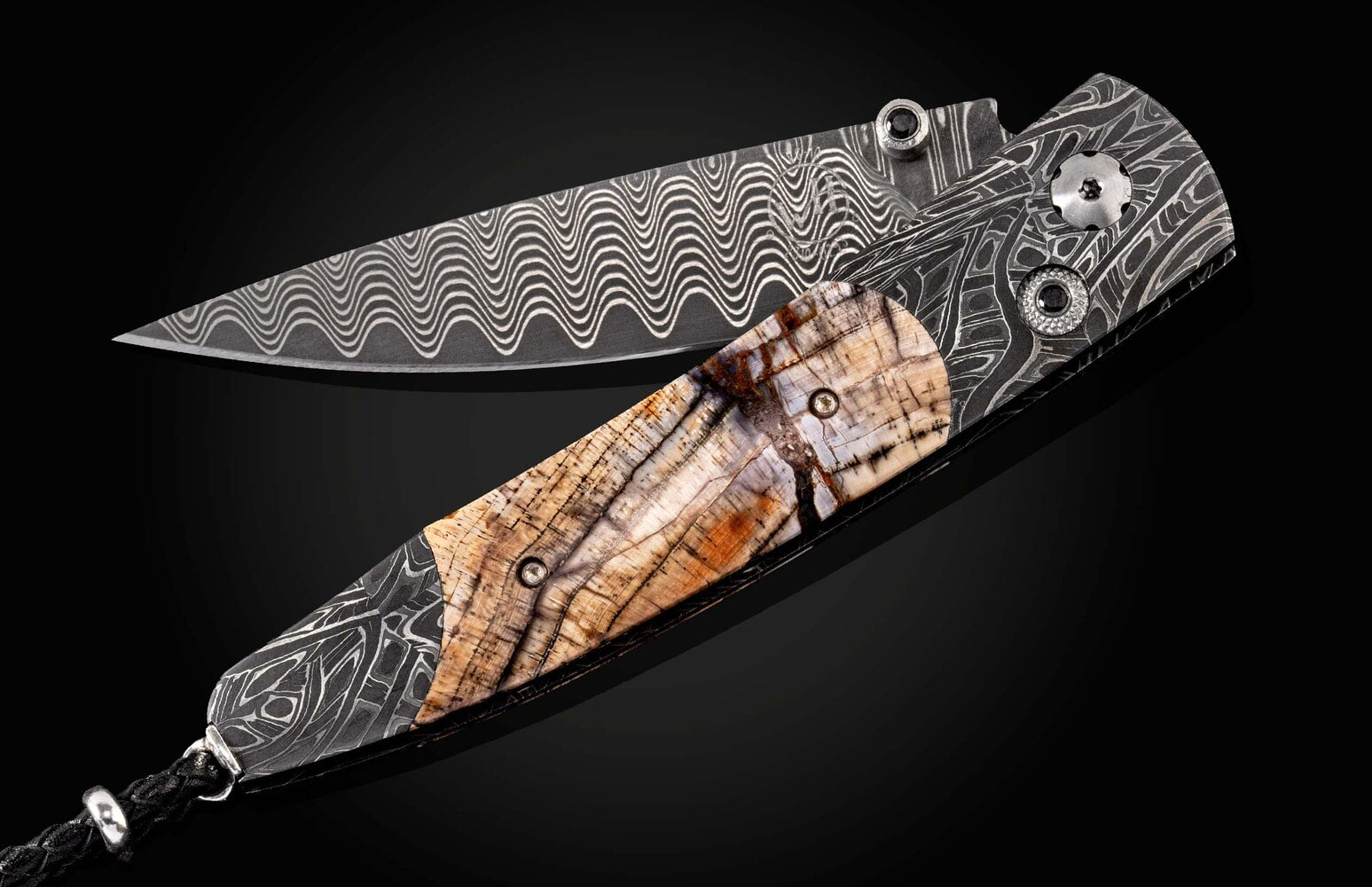 William Henry Pocketknife featuring etched damascus, fossil Mammoth tusk, and 'wave' damascus blade B10 DARK RING
